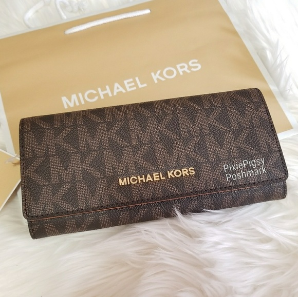 Michael Kors Handbags - Michael Kors Jet Set Carryall Signature Wallet